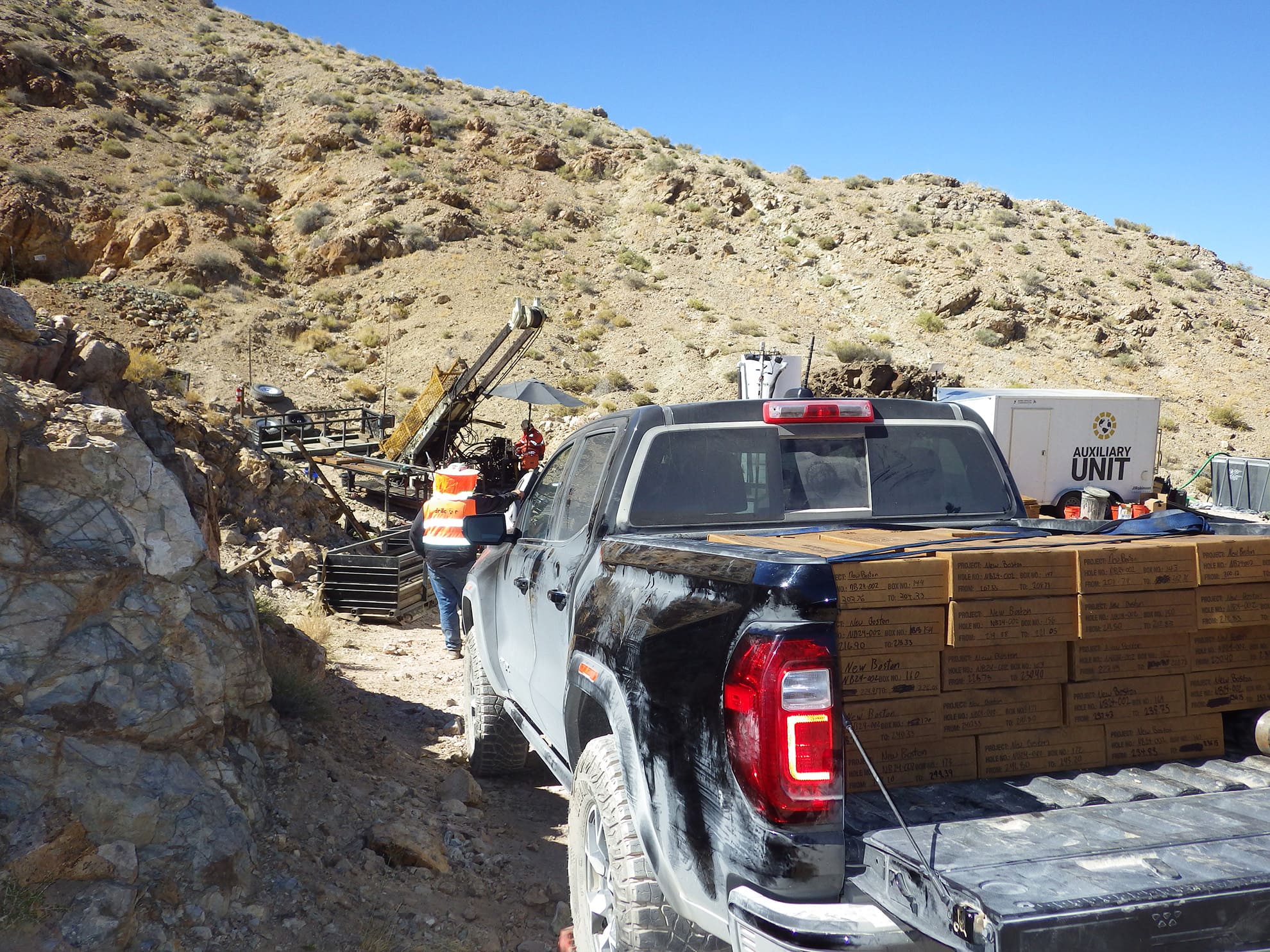 Vein stockwork in limestone in outcrop at drill pad for drill hole NB24-002, June, 2024.